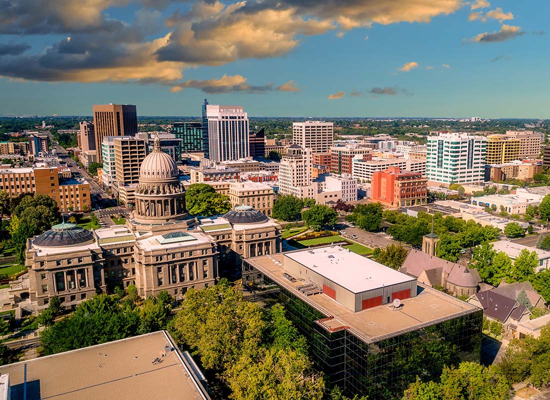 Boise, ID - View of Apartments and Commercial Buildings in Downtown Boise Idaho with a Cloudy Sunset Sky